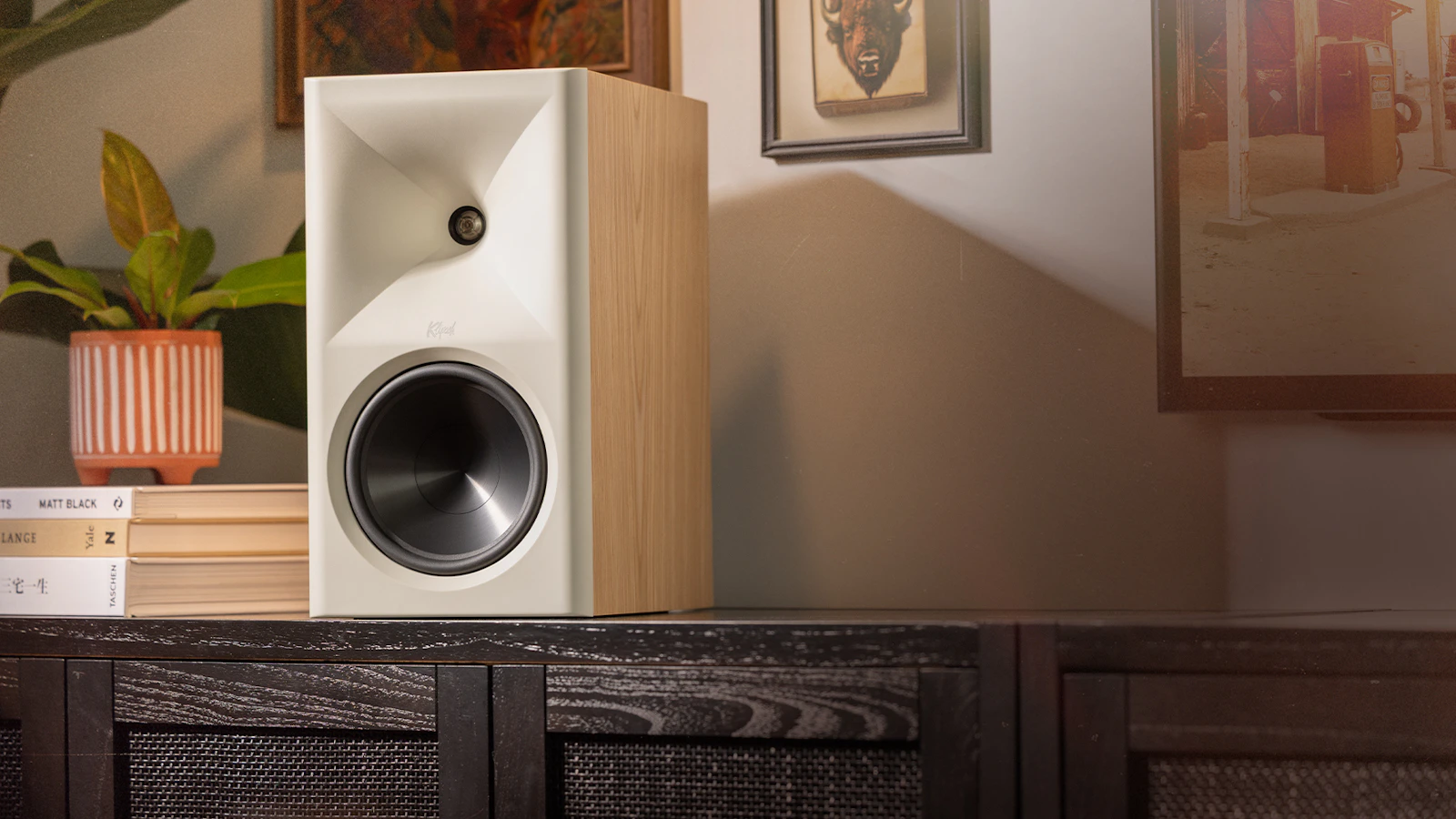 A Klipsch The Sevens II speaker on a media console